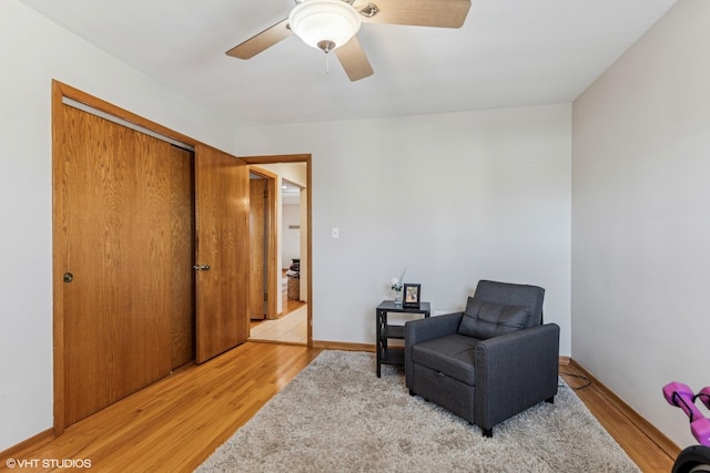 6810 N Ozark Ave Unit 9, Chicago, IL 60631 - sitting room featuring light wood-style floors and ceiling fan