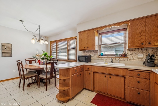 6810 N Ozark Ave Unit 9, Chicago, IL 60631 - kitchen featuring a sink, open shelves, light countertops, and black microwave