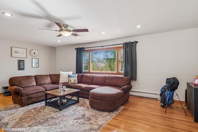 6810 N Ozark Ave Unit 9, Chicago, IL 60631 - living room with a baseboard heating unit, wood finished floors, ceiling fan, and recessed lighting