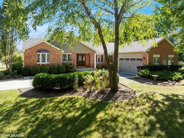 14705 Pleasant Valley Rd, Woodstock, IL 60098 - traditional-style home featuring an attached garage, brick siding, and a front yard