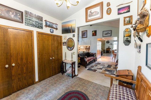 1479 Old Mill Rd, Franklin Grove, IL 61031 - tiled foyer with vaulted ceiling, a chandelier, and carpet