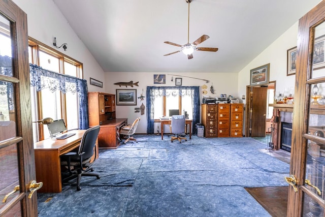 1479 Old Mill Rd, Franklin Grove, IL 61031 - office space with lofted ceiling, healthy amount of natural light, a tiled fireplace, and ceiling fan