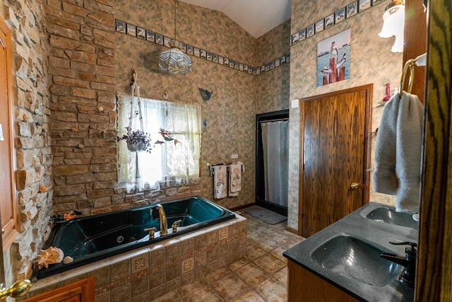 1479 Old Mill Rd, Franklin Grove, IL 61031 - full bath with vaulted ceiling, a whirlpool tub, and double vanity