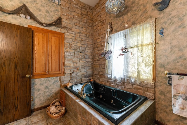 1479 Old Mill Rd, Franklin Grove, IL 61031 - full bath featuring a tub with jets, tile patterned flooring, and baseboards