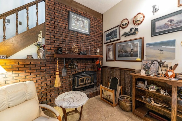 1479 Old Mill Rd, Franklin Grove, IL 61031 - living area featuring tile patterned flooring and brick wall