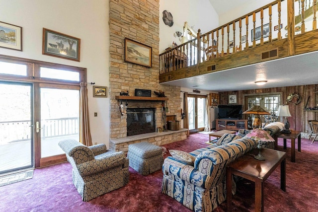 1479 Old Mill Rd, Franklin Grove, IL 61031 - living area featuring a high ceiling, carpet floors, a fireplace, and french doors