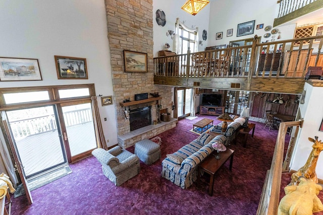 1479 Old Mill Rd, Franklin Grove, IL 61031 - carpeted living room featuring a towering ceiling and a fireplace