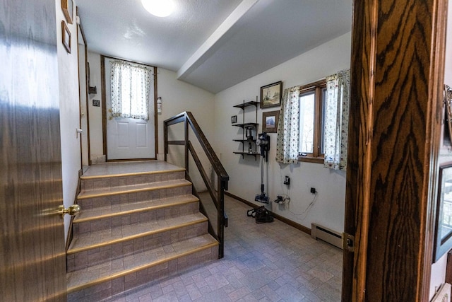 1479 Old Mill Rd, Franklin Grove, IL 61031 - foyer entrance with a baseboard radiator, baseboards, brick patterned floors, and stairs