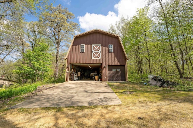 1479 Old Mill Rd, Franklin Grove, IL 61031 - view of front of house featuring a barn, a gambrel roof, a garage, an outbuilding, and driveway