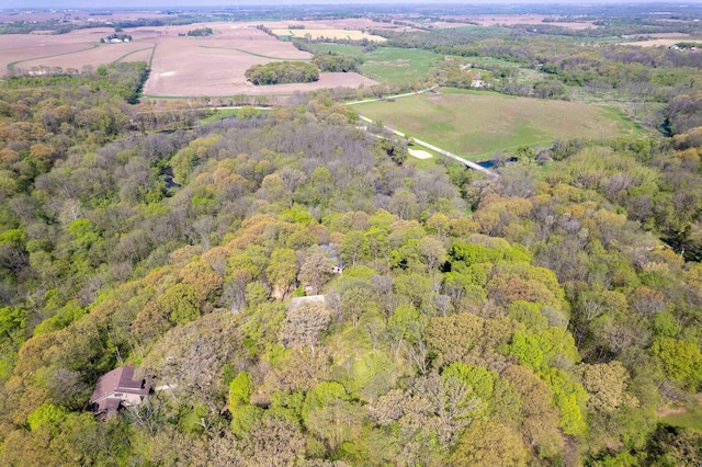 1479 Old Mill Rd, Franklin Grove, IL 61031 - aerial view of property and surrounding area featuring a heavily wooded area