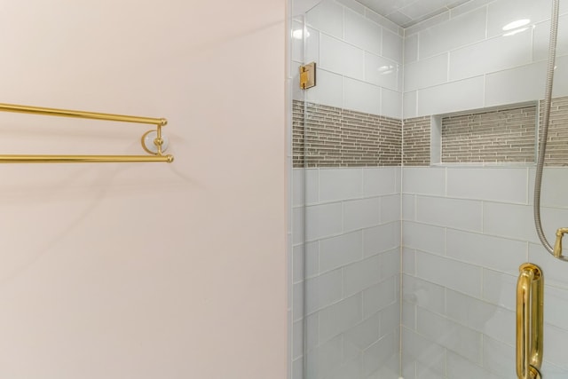bathroom featuring a stall shower