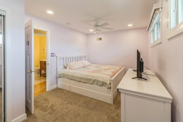 bedroom with light colored carpet, recessed lighting, ceiling fan, and baseboards