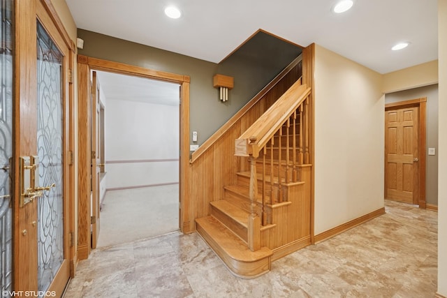 stairs featuring recessed lighting and baseboards