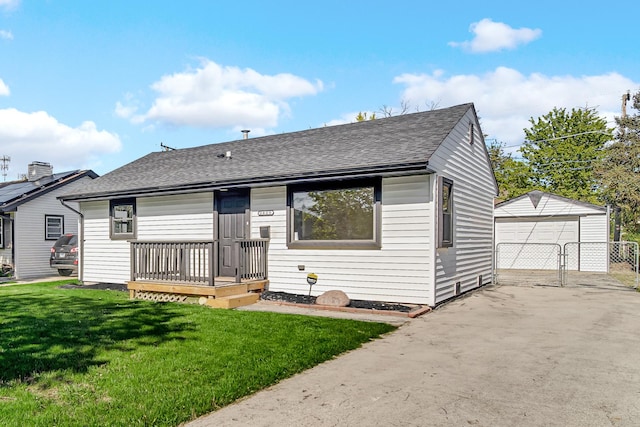 2825 S 13th Ave, Broadview, IL 60155 - view of front of property featuring a shingled roof, an outdoor structure, and a detached garage