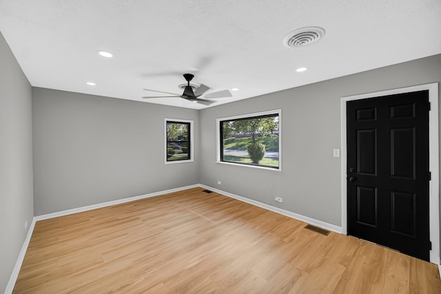 2825 S 13th Ave, Broadview, IL 60155 - foyer featuring light wood-style flooring, baseboards, ceiling fan, and recessed lighting