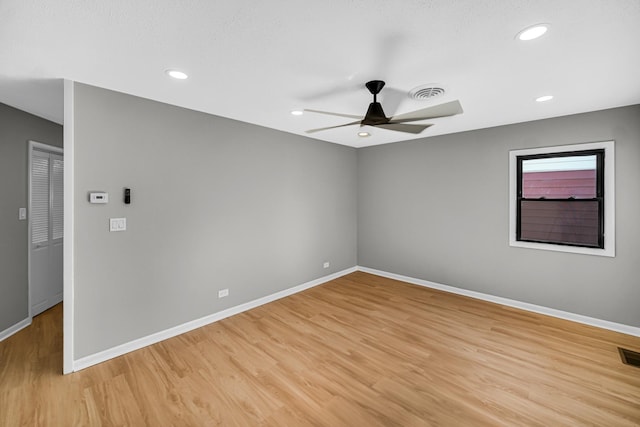 2825 S 13th Ave, Broadview, IL 60155 - unfurnished room with a ceiling fan, baseboards, light wood finished floors, and recessed lighting