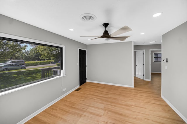 2825 S 13th Ave, Broadview, IL 60155 - empty room with light wood-style flooring, a ceiling fan, baseboards, and recessed lighting