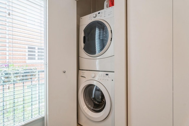 1835 W Oakdale Ave Unit E, Chicago, IL 60657 - laundry room with stacked washer and clothes dryer and plenty of natural light