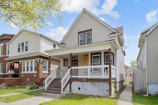 7813 S May St, Chicago, IL 60620 - view of front facade with covered porch and brick siding