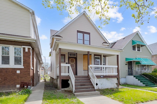 7813 S May St, Chicago, IL 60620 - view of front of house featuring a porch
