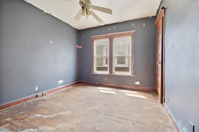 7813 S May St, Chicago, IL 60620 - spare room featuring a ceiling fan and baseboards