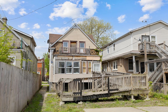 7813 S May St, Chicago, IL 60620 - rear view of property featuring fence, a balcony, and a wooden deck