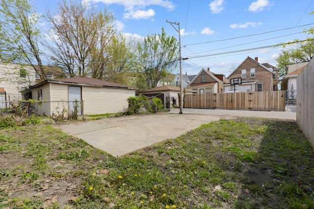 7813 S May St, Chicago, IL 60620 - view of yard featuring fence, a gate, and a residential view