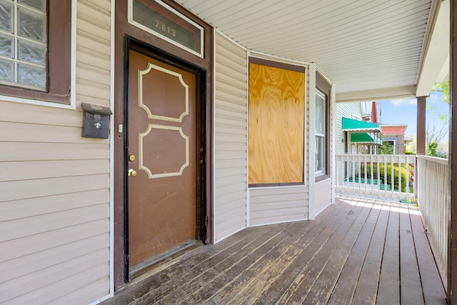 7813 S May St, Chicago, IL 60620 - wooden deck featuring covered porch