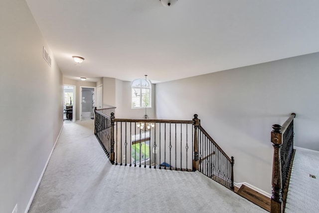 1571 W Rue James Pl, Palatine, IL 60067 - corridor featuring an upstairs landing, carpet flooring, baseboards, and healthy amount of natural light