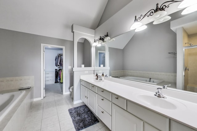 1571 W Rue James Pl, Palatine, IL 60067 - bathroom with vaulted ceiling, tile patterned flooring, a shower stall, a bath, and double vanity