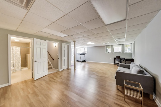 1571 W Rue James Pl, Palatine, IL 60067 - living room featuring stairway, light wood-style floors, a drop ceiling, and baseboards
