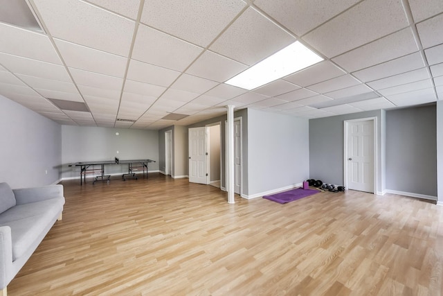 1571 W Rue James Pl, Palatine, IL 60067 - unfurnished living room with light wood-style floors, baseboards, and a drop ceiling