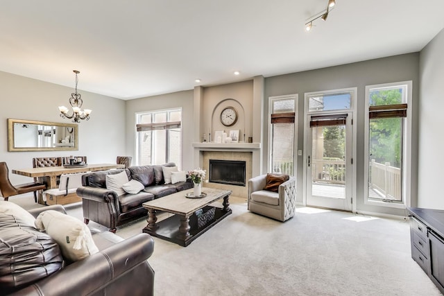 1571 W Rue James Pl, Palatine, IL 60067 - carpeted living room with a chandelier, a tile fireplace, and recessed lighting