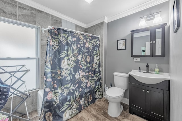 full bath featuring crown molding, curtained shower, wood finished floors, toilet, and vanity