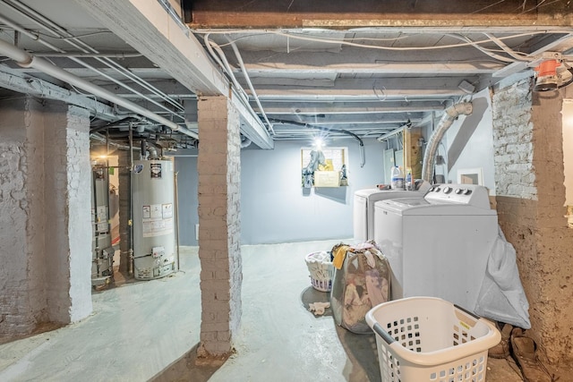 unfinished basement with independent washer and dryer and water heater