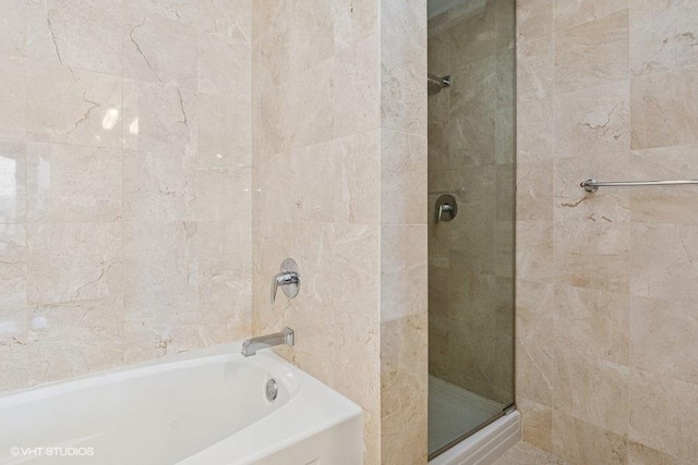 1400 S Michigan Ave Unit 2303, Chicago, IL 60605 - full bath featuring a shower, a tub to relax in, and tile walls
