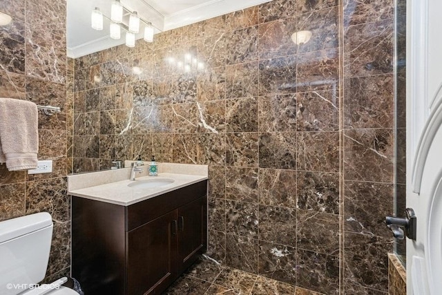 1400 S Michigan Ave Unit 2303, Chicago, IL 60605 - bathroom featuring ornamental molding, tile walls, vanity, and toilet