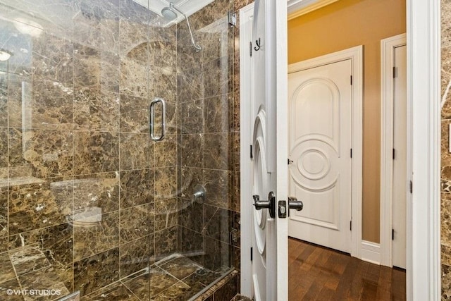 1400 S Michigan Ave Unit 2303, Chicago, IL 60605 - bathroom with a stall shower and wood finished floors