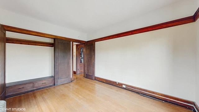 1366 E 57th St Unit 3, Chicago, IL 60637 - unfurnished bedroom featuring light wood-style flooring