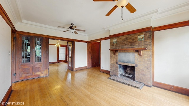 1366 E 57th St Unit 3, Chicago, IL 60637 - unfurnished living room featuring a ceiling fan, wood-type flooring, crown molding, a fireplace, and baseboards