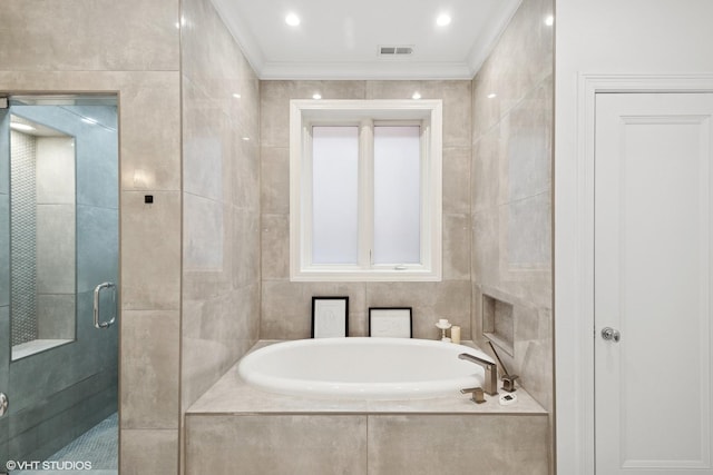 1759 W Surf St, Chicago, IL 60657 - bathroom with a bath, a stall shower, ornamental molding, and tile walls