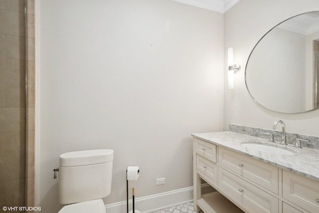 1759 W Surf St, Chicago, IL 60657 - full bathroom featuring crown molding, toilet, vanity, and baseboards