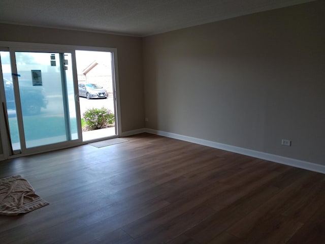 7537 175th St Unit 514, Tinley Park, IL 60477 - empty room featuring dark wood finished floors and baseboards