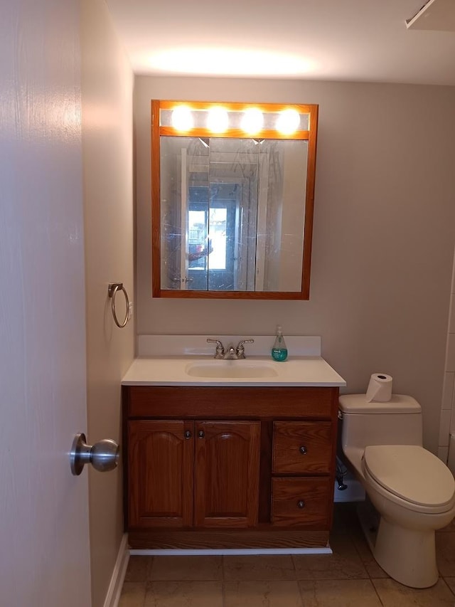 7537 175th St Unit 514, Tinley Park, IL 60477 - bathroom with vanity, toilet, and tile patterned floors