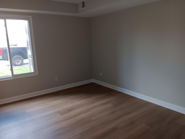 7537 175th St Unit 514, Tinley Park, IL 60477 - spare room featuring dark wood finished floors and baseboards