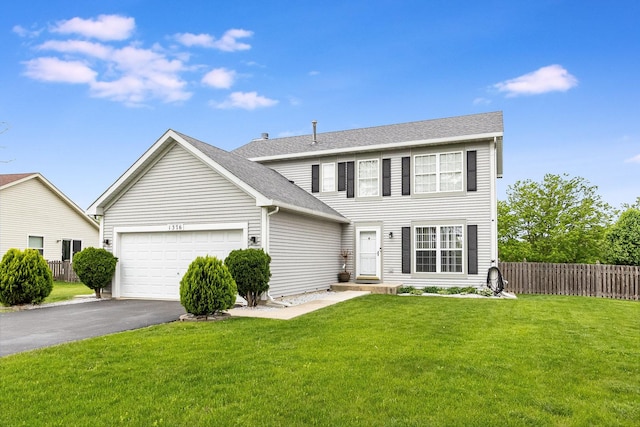 1376 Dahlgren Ln, Minooka, IL 60447 - colonial house with a garage, driveway, and roof with shingles