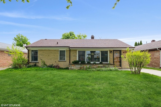 7745 S Kilpatrick Ave, Chicago, IL 60652 - single story home with brick siding, a front lawn, a chimney, and a shingled roof