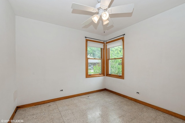 7745 S Kilpatrick Ave, Chicago, IL 60652 - empty room featuring baseboards and a ceiling fan