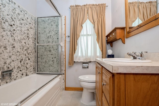 7745 S Kilpatrick Ave, Chicago, IL 60652 - full bathroom featuring toilet, tile patterned floors, vanity, and baseboards