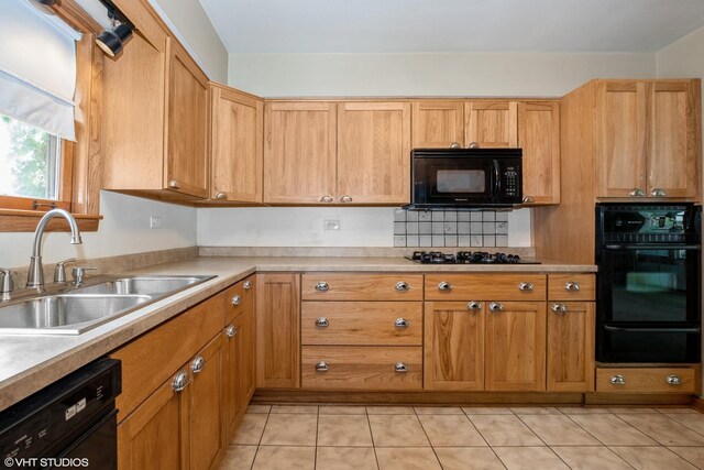 7745 S Kilpatrick Ave, Chicago, IL 60652 - kitchen featuring black appliances, a warming drawer, a sink, and light countertops